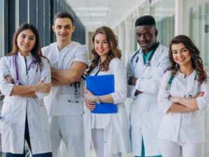 team-young-specialist-doctors-standing-corridor-hospital